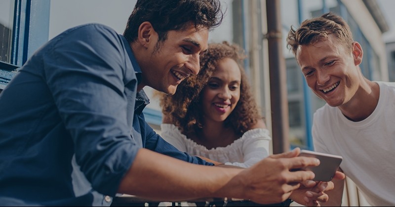 Young group of people by phone