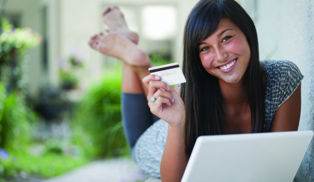 Young girl with credit card