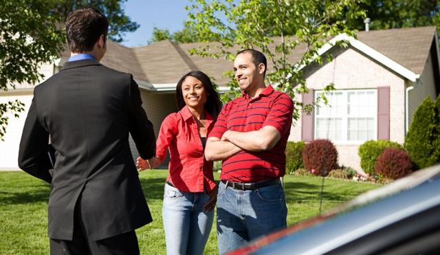 couple outside house