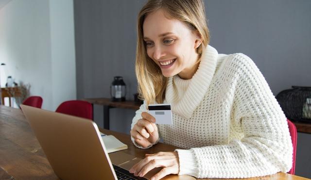 woman looking at computer