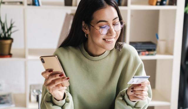 Woman looking at card