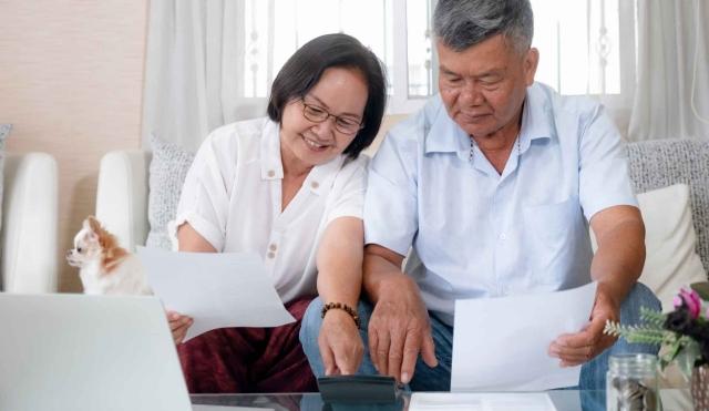 Couple reviewing financial institutions