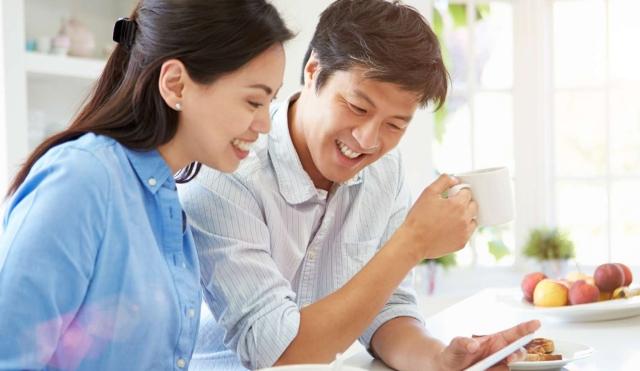 couple reviewing finances online