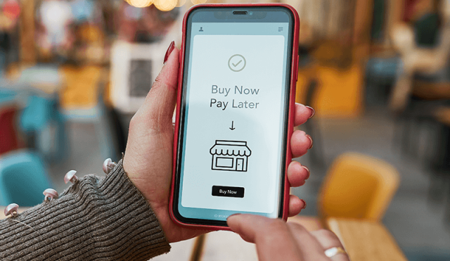 Phone with "Buy Now, Pay Later" on screen