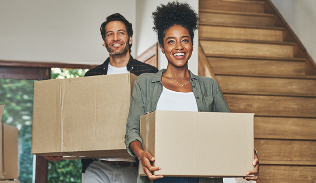 Couple moving boxes