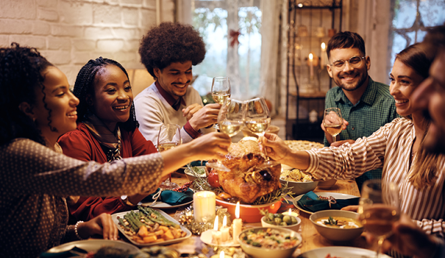 friends eating holiday dinner