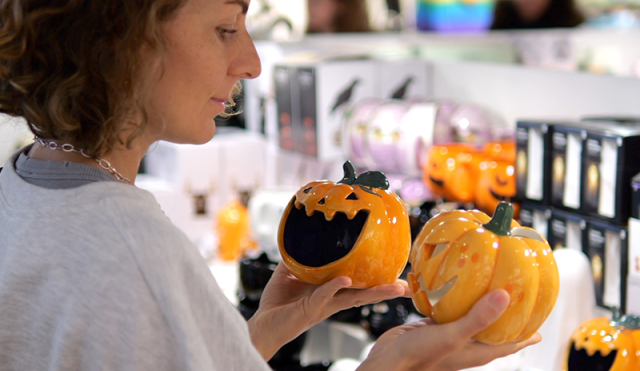 Woman pumpkin shopping