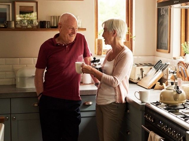 Retired couple drinking coffee