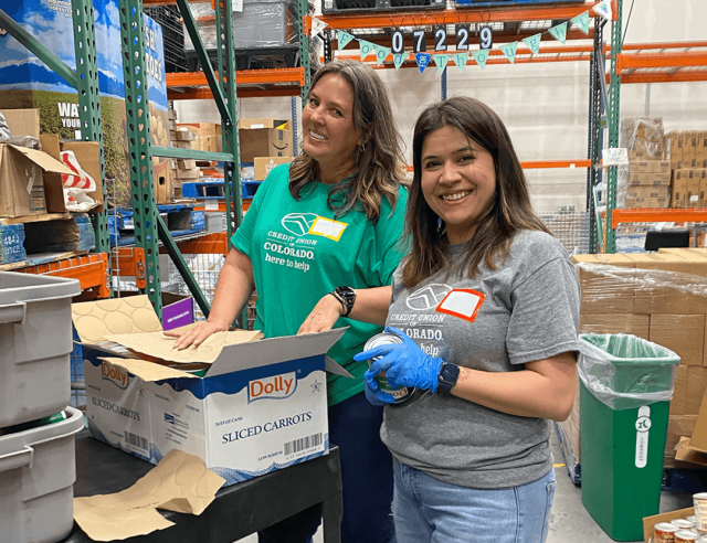 Two people working in a warehouse