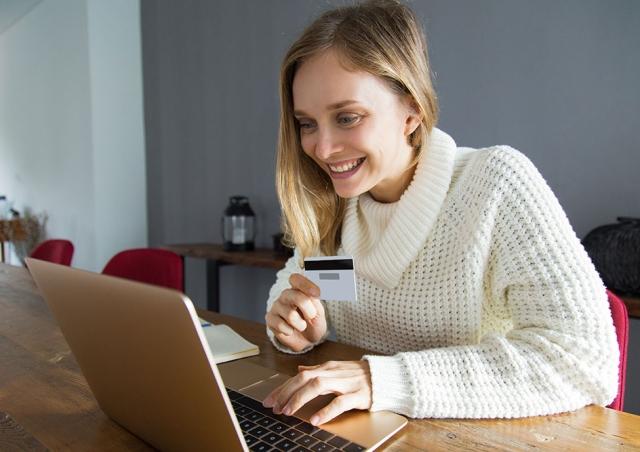 woman looking at computer