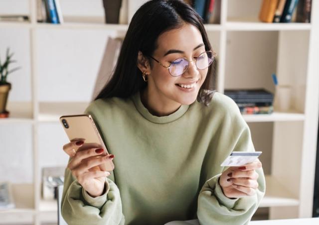 Woman looking at card