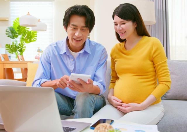 Couple looking at their taxes