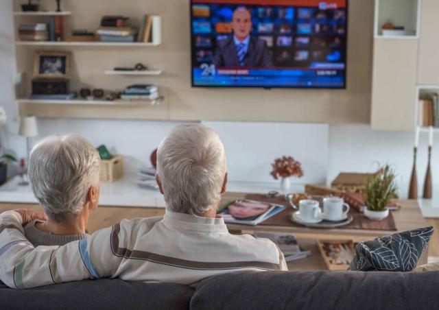 Couple watching the news