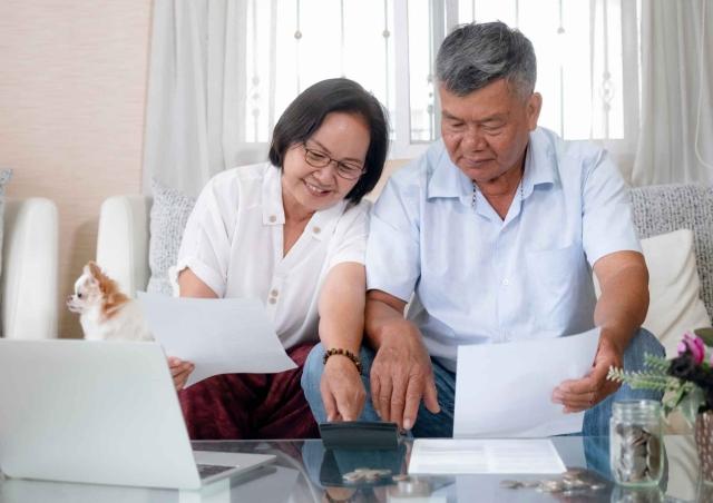 Couple reviewing financial institutions