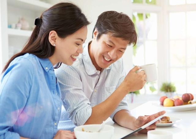 couple reviewing finances online