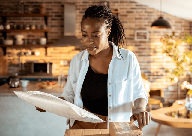 Woman looking through packages