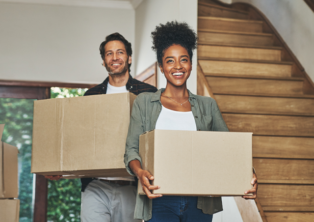 Couple moving boxes