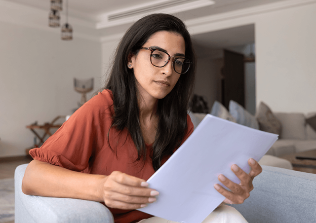 Woman looking at papers